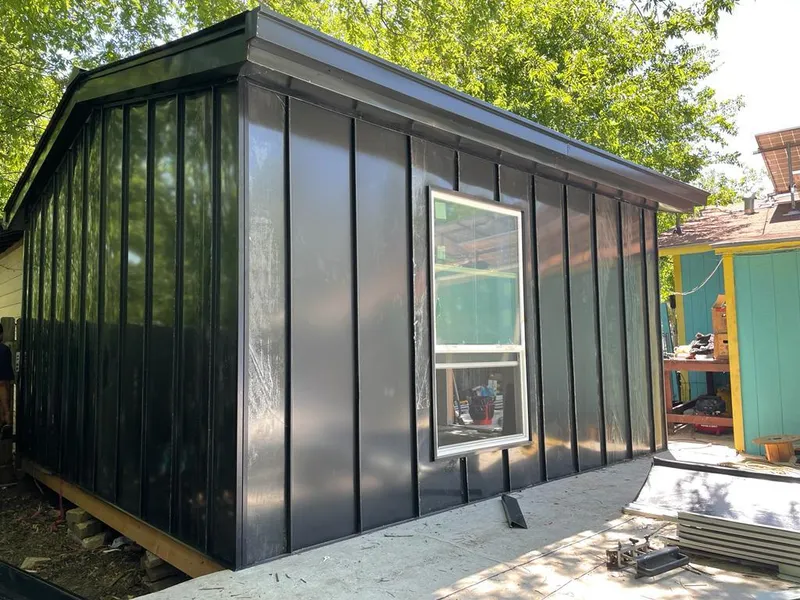 Black standing seam metal wall panels for Roof Inspection in Old Orchard Beach
